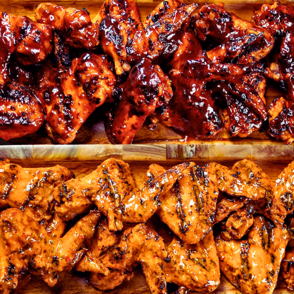 Grilled chicken dozen of wings served with seasoned rice