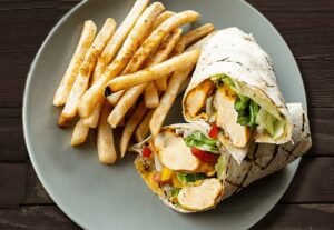 Zabiha Halal Doner Wrap filled with lettuce, tomato, cucumber, and garlic mayo served at La Peri Peri in Sterling Heights, MI