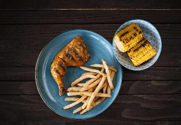 Grilled 1/4 chicken leg and thigh served with fries